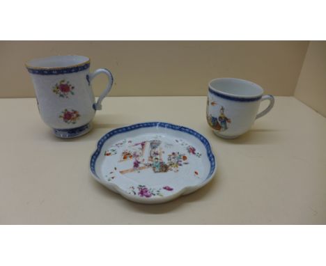 A Chinese Qianlong period chocolate cup together with a coffee can and spoon tray decorated in coloured enamels on a moulded 