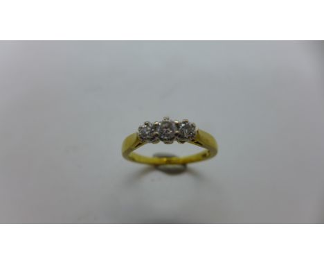 An 18ct yellow gold hallmarked 3-stone diamond ring size M,approx 3gs, some scratches to inner shank, diamonds bright 