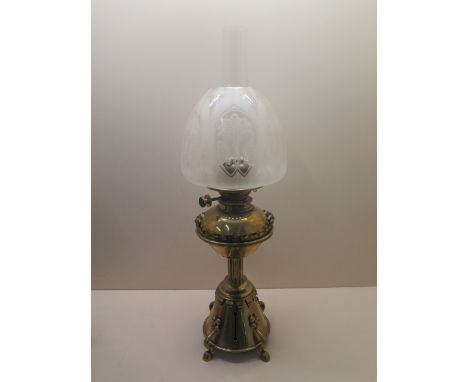A Benham Froud Arts and Crafts brass oil lamp with an etched shade - Height 62cm to top of chimney - in good overall conditio