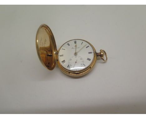 An 18ct gold full Hunter pocket watch by Barrands Cornhill London no 7613 with white enamel dial with second dial, gold spade