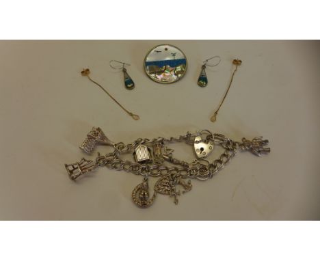 A silver charm bracelet, a mother of pearl brooch and earrings and a pair of opal 9ct gold earrings. All generally good.Brooc