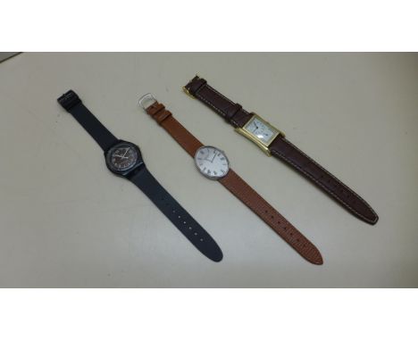 2 Swiss made gentlemans favre-leuba wristwatches. Both are manually wound movements. The large doctors style dialled watch is