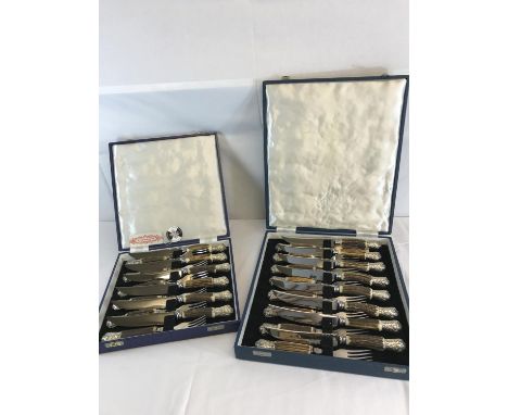 2 Canteens of silver plated and horn handled cutlery sets 