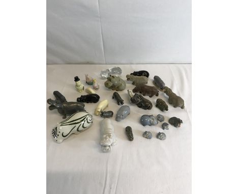 A collection of metal, lead & ceramic hippos to include Wade & The Moomans 