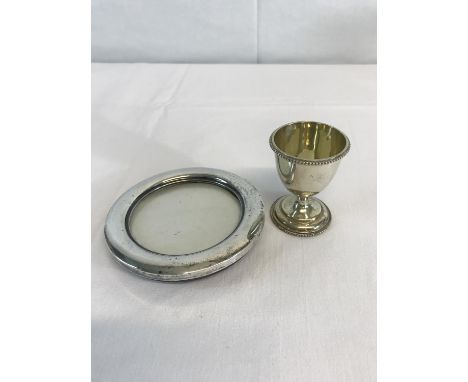 Birmingham silver round photo frame and egg cup 