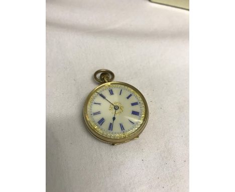 A 9ct gold pocket watch with ceramic face working order 