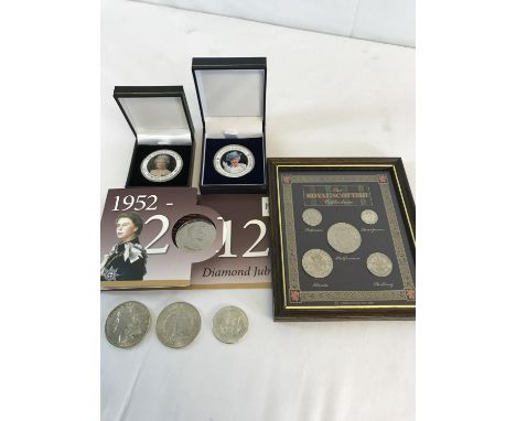 A Selection of collectable coins to include 2 1885 silver one dollar coins (Mintmark New Orleans)  Kennedy half dollar 1964 &