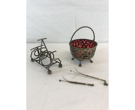 EP Ornate swing handle preserve with cranberry glass insert, A 6 slice Toast rack & 2 silver items.