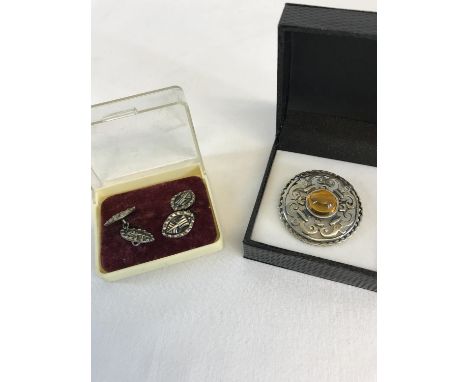 A Pair of Iain MacCormack Sterling silver Iona cuff links together with silver & amber style stone brooch 