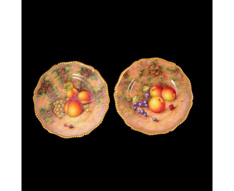 Pair of Royal Worcester fruit painted cabinet plates, circular with gilt gadrooned serpentine edge, one signed Freeman one si