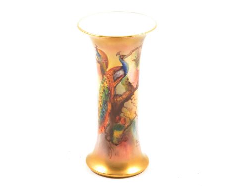 Royal Worcester, a vase painted with Peacocks by J Flexman, dated 1920, 15cm.Condition report:An underglaze pinpoint nick to 