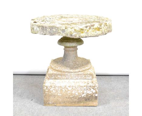 Stone garden pedestal with a mill stone top, diameter 68cm, height 72cm, and a stone shallow planter.Qty: 2