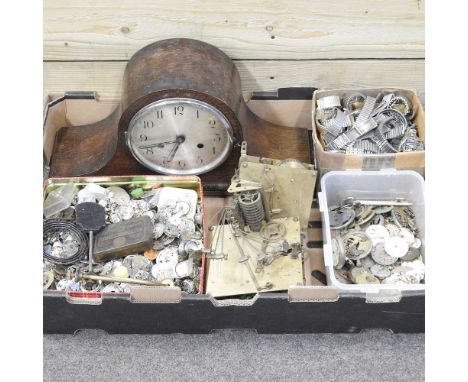 A collection of watch parts, together with a mantel clock