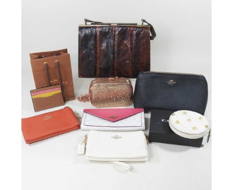 A Carvela patent ladies purse, 14cm wide, together with a collection of Coach purses and a vintage snake skin handbag