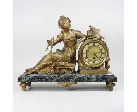 A 19th century gilt spelter figural mantel clock, on a marble base, 43cm wide
