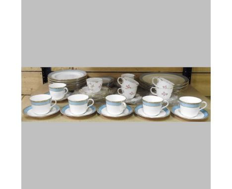 A Royal Crown Derby Fifth Avenue tea and dinner service, together with a Royal Crown Derby Pinxton Rose tea service