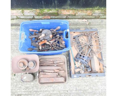 A collection of hand tools and metalwares