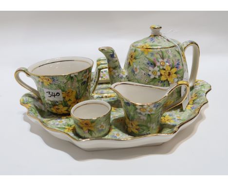 A Royal Winton 1995 Richmond chintz breakfast set comprising teapot, cup, milk jug, sugar bowl and toast rack on tray Conditi