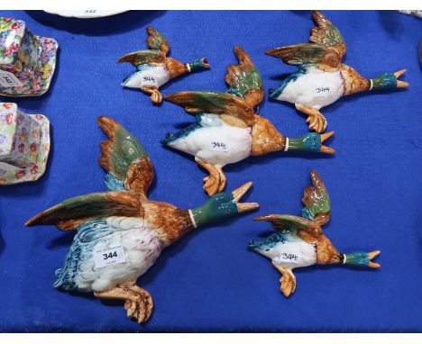 Five Beswick flying ducks, including models 596-0, 1, 2, 3,4 Condition Report: all have light crazing and the smallest one ha