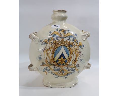 A Italian tin glazed moon flask, with handles and decorated with cherubs Condition Report: Available upon request