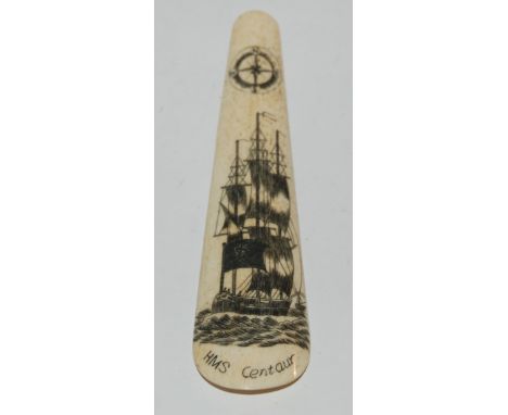 An early marine ivory shoe horn engraved with masted ship, entitled HMS Centaur, 14cm high Condition Report: Available upon r