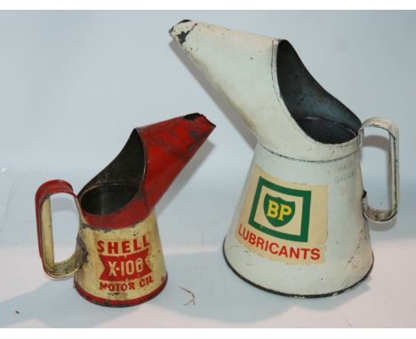 A BP oil can, Shell X-100 oil can, advertising tins and various Ordnance Survey maps etc in wooden New Zealand Apple crate Co