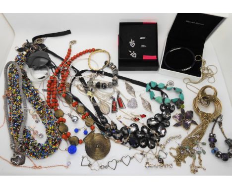 A silver locket and chain, silver bangle and a collection of other silver and costume jewellery Condition Report: Not availab