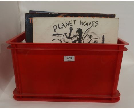 A box of vinyl LP records to include Bob Dylan, ELO, Stevie Wonder, The Three Degrees, Tina Turner etc Condition Report: Avai