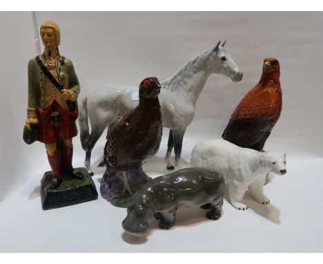A Beswick grey racehorse, a polar bear, a hippopotamus, a golden eagle and grouse decanter and a Drambuie advertising figure 