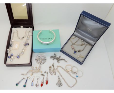 A silver bangle stamped Tiffany &amp; Co, and a collection of silver and white metal jewellery Condition Report: Not availabl