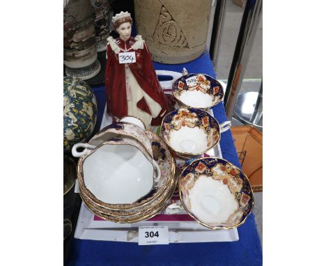 A Royal Worcester figure of the Queen, three Royal Albert Heirloom cups, two Salisbury cups and five saucers Condition Report