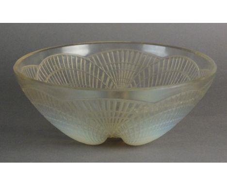 A Rene Lalique 'Coquilles' pattern bowl, circa 1925, stencil R. Lalique mark and no. 3200, 24cm diameter 