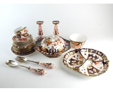 A mixed collection of Royal Crown Derby Imari, including a pair of candlesticks (repaired) pattern 383, 15.5cm high, a sugar 