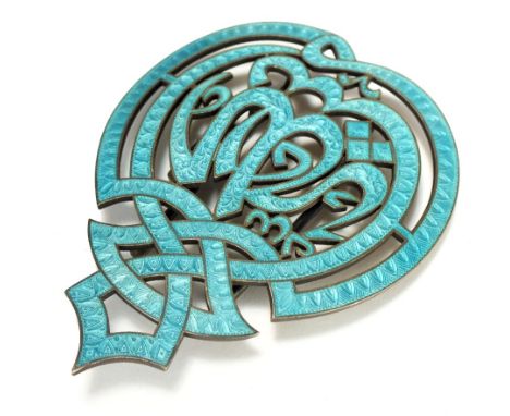 A guilloche enamel openwork belt buckle, 19th/20th Century, worked forming Arabic text within a knotted ribbon, 9cm.
