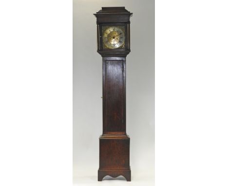 An 18th century oak eight day longcase clock the 11.25 inch square brass dial signed Mark Metcalfe with cantered date apertur