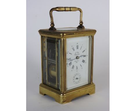 A late 19th century carriage alarm clock, the 2.5 inch rectangular dial with inner ring of Roman numerals, outer ring of Arab