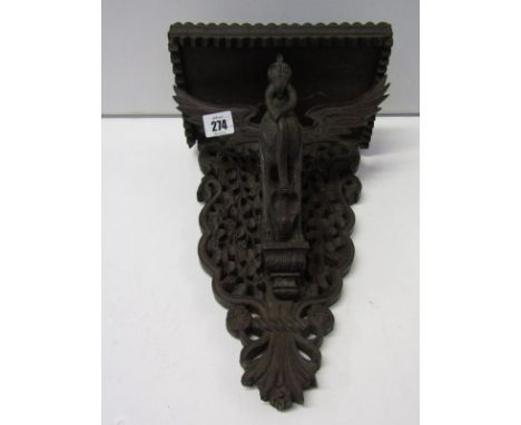 EASTERN CARVING, a Burmese design carved eagle and cobra support bracket shelf 
