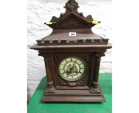 VICTORIAN BRACKET CLOCK, a Continental architectural cased bracket clock with coiled bar strike and cupid painted clock face 