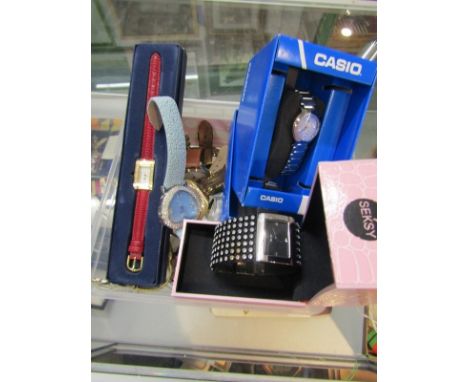 DESIGNER WRIST WATCHES; A box of assorted watches including Fossil, Seksy, Casio etc 