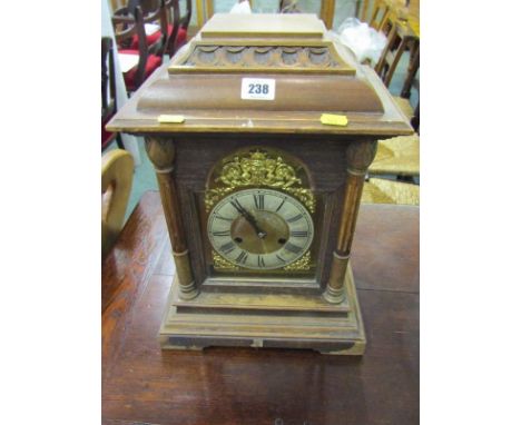 CONTINENTAL BRACKET CLOCK, oak architectural cased bracket clock with gilt arch face and coiled bar strike, 16" height 
