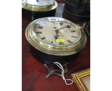 BRASS CASED CIRCULAR SHIP'S CLOCK (working order) with key 