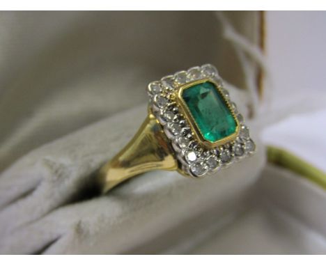 18ct YELLOW GOLD EMERALD &amp; DIAMOND RING, central rectangular cut emerald of good colour and clarity surrounded by 20 acce