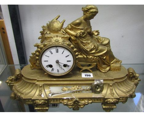 FRENCH MANTEL CLOCK, 19th Century gilt metal mantel clock with seated lady cresting and coiled bar strike pendulum, 12" heigh