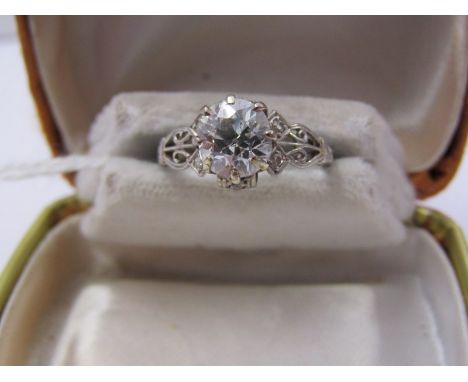 PLATINUM DIAMOND SOLITAIRE VINTAGE OLD CUT DIAMOND SOLITAIRE of good colour and clairty, set in 8 claw mount on decorative pl