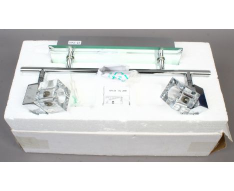 A new and unused futuristic chrome on mirror wall light with adjustable clear glass cube shaped shades and low voltage, 12 v 