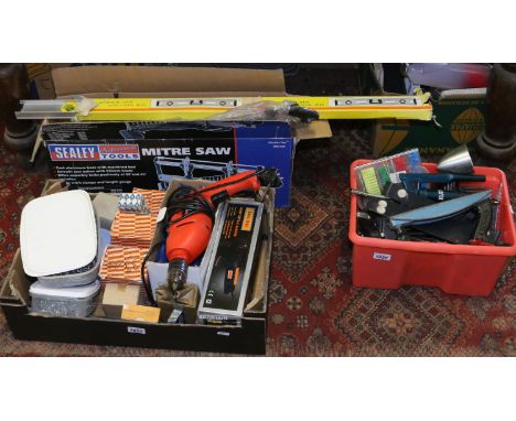 A collection of hand tools Sealey mitre saw, hand saws, spirit level Black and Decker drill, Challenge detail sander, various