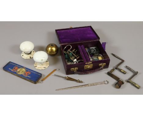 A velvet lined jewellery box in the form of a miniature suitcase and contents lock keys, silver coins etc longcase clock fini