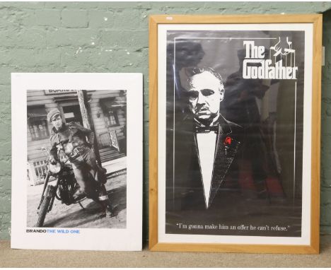 A framed print 'Marlin Brando/The Godfather' along with unframed Brando print 'The Wild One'.