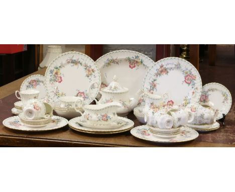A six place Royal Albert tea/dinner service decorated in the Constance pattern.