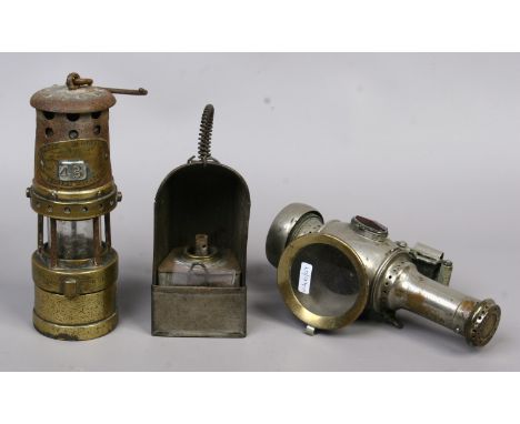 A Thomas & William Aberdeen midget miners lamp, a Lucas candle lamp and an open shielded tin lamp. 